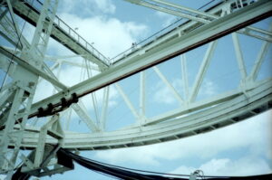 Andrea & Owen on top of fixed, triangular platform; parts of circular track and azimuth arm are visible